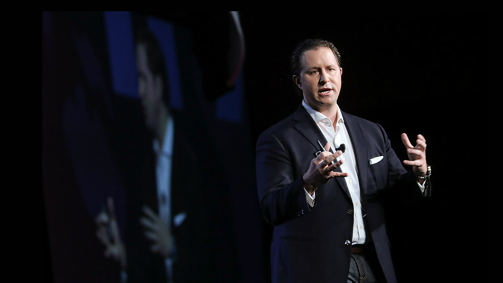Sam Caucci keynote speaker on stage